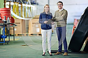 Warehouse, portrait and people with clipboard for shipment, inventory and boxes for shipping. Colleagues, team and