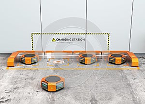 Warehouse robots charging at charging station