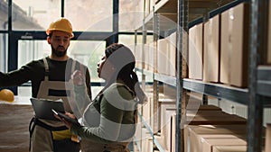 Warehouse staff crosscheck inventory