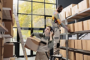 Warehouse team looking at shelves full with clients orders,