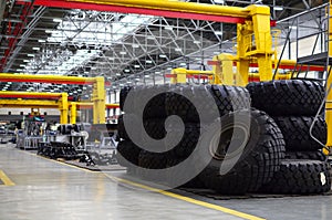 Warehouse with tires for trucks at an industrial plant for the production of cars. Automotive services.