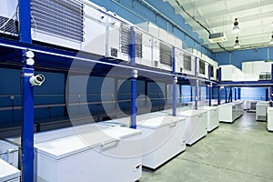 Warehouse with white refrigerators