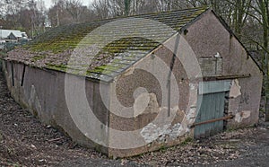 warehouse in the woods with old steel shutter