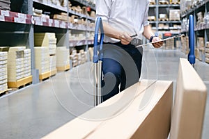 Warehouse worker checking goods at warehouse