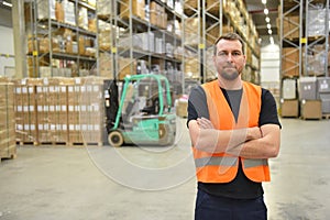 Warehouse worker scans parcels in the warehouse of a forwarding company for transport