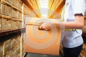 Warehouse worker taking package