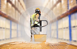 Warehouse Worker using Hand Pallet Jack Unloading Package Boxes. Commerce Supply Chain. Shipment. Storage Warehouse Shipping Cargo