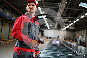 Warehouse worker working on a conveyor line