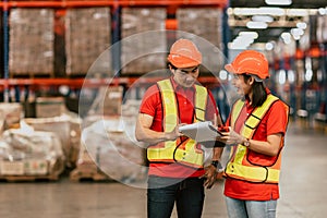 Warehouse worker working together happy smile work checking inventory stock order for shipping