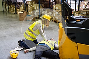 Warehouse workers after an accident in a warehouse.