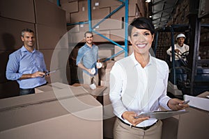 Warehouse workers preparing a shipment