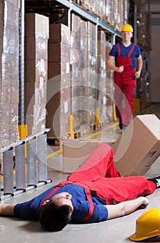 Warehouseman after accident at height photo