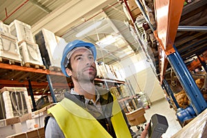 Warehouseman scanning merchandise