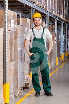 Warehouseman standing in storage photo