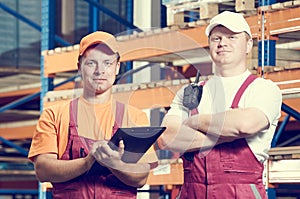 Warehousing. Two warehouse workers photo
