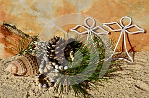 Warm Beach Christmas pine cone white beaded angels beach sand and shell Christmas in July
