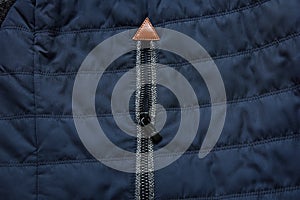 Warm blue dark zipper jacket fabric texture background close-up