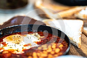 Warm breakfast. Shakshuka with egg