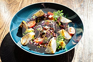 Warm chicken liver salad with port wine-honey sauce. Carrot cream, bacon, cherry tomatoes, brioche. Delicious healthy