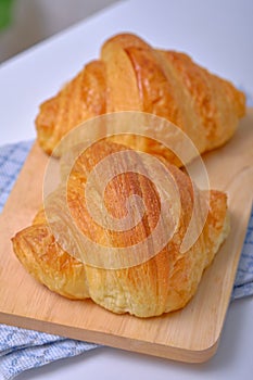 Warm Fresh Buttery Croissants and Rolls. French and American Croissants and Baked Pastries are enjoyed