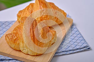 Warm Fresh Buttery Croissants and Rolls. French and American Croissants and Baked Pastries are enjoyed