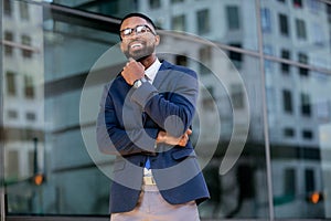 Warm friendly african american business man portrait, cheerful smile with a fun personality