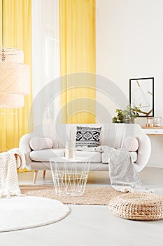 Warm interior with yellow drapes