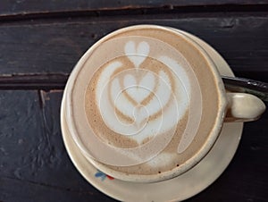 Warm latte art coffee that tastes delicious