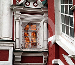 Warm light windows on a cold autumn day.