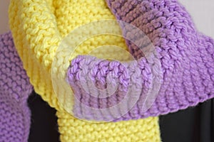 A warm lilac-yellow scarf.