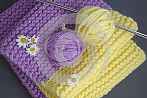 A warm lilac-yellow scarf.