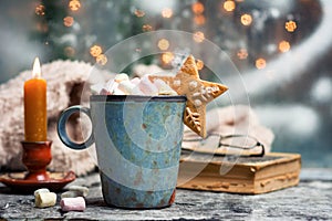 Warm marshmallow dessert beverage on Christmas decorated table