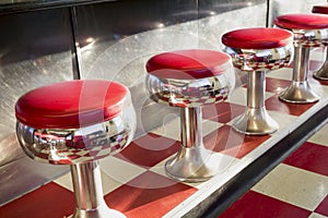 Warm Morning Sunlight Highlights These Beautifully Classic Diner Seats photo