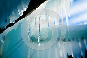 Warm pleasant icicles background with warm light reflections