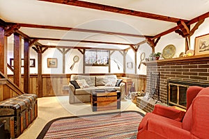 Warm rustic furnished living room with a fireplace