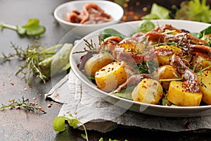 Warm salad with anchovy and baby potatoes and wholegrain mustard