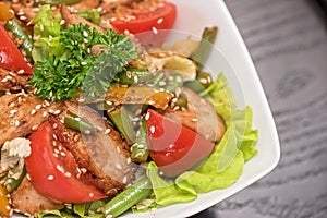 Warm salad with chicken