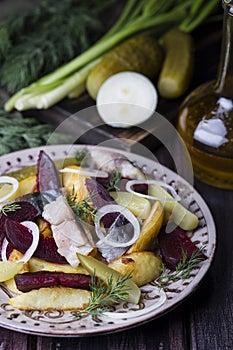 Warm salad of potatoes and smoked mackerel
