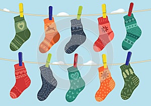 Warm socks hanging on the rope.