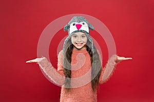 Warm and stylish trapper hat for kid. happy little girl in earflap hat. small child ready for winter. seasonal