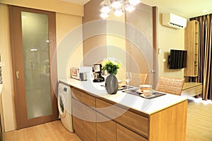 Warm tone of luxury interiors design in the condominium, as background.