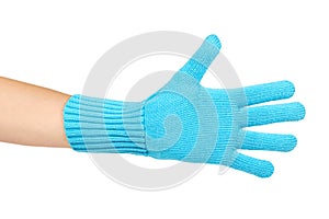 Warm winter children`s gloves in hand isolated on white background. Sale and buy