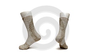 Warm women`s sock made of wool on a white background