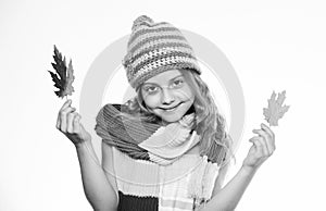 Warm woolen accessories. Hat and scarf keep warm. Fall fashion concept. Kid wear warm knitted hat and long scarf. Which