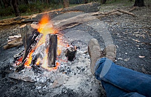 Warming Feet by Campfire