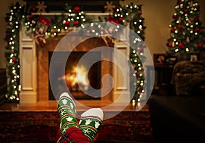 Warming Feet in Holiday Socks by Fire