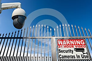 Warning 24 Hour Video Security Cameras in Use and Gate of a Private Property