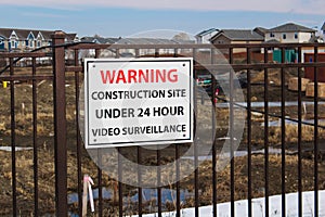 Warning construction site under 24 hour video surveillance