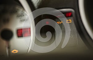 Warning lights in the dashboard of a car