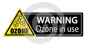 Warning, ozone in use. Yellow triangle warning sign with symbol. Text by side